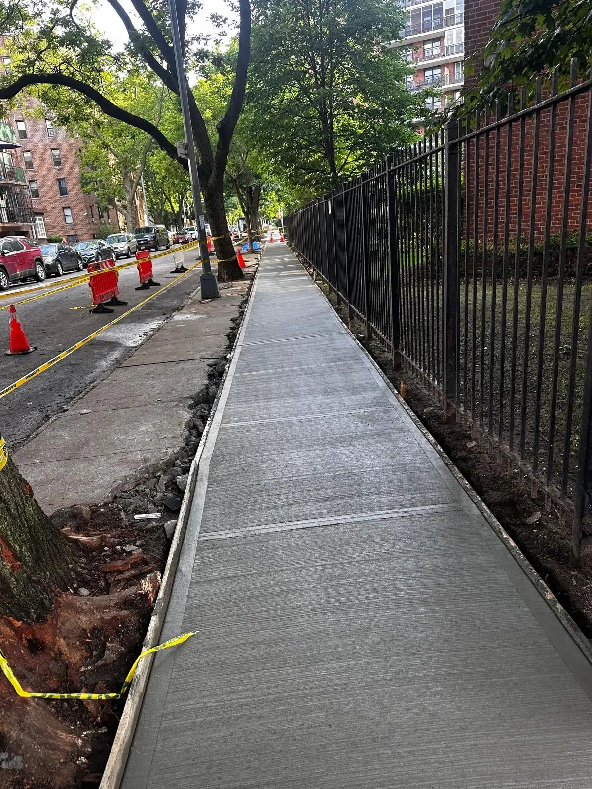 repaired sidewalk in June