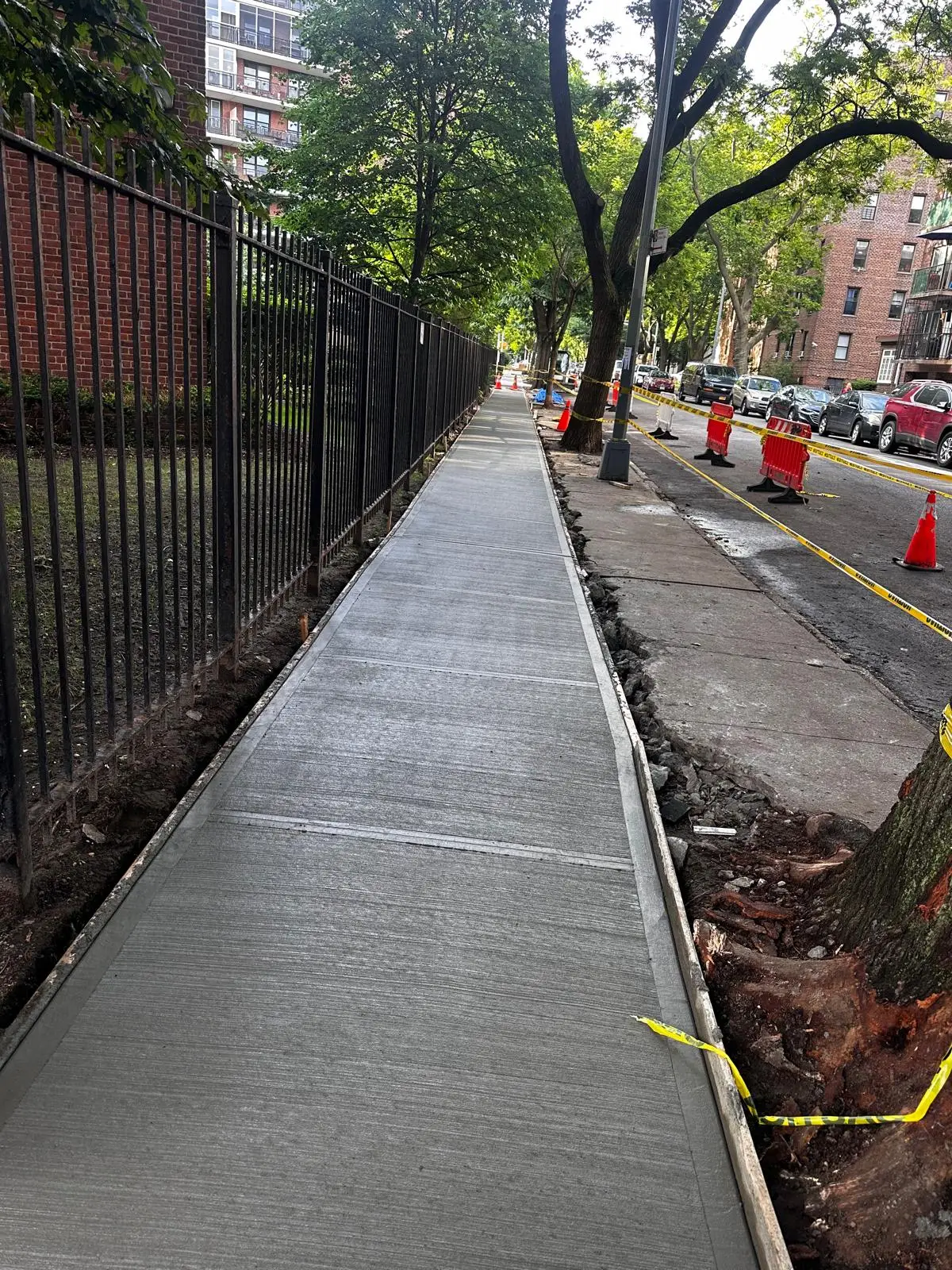 repaired sidewalk in June