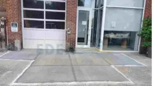 sunken sidewalk slabs leveled up on sidewalk in NYC